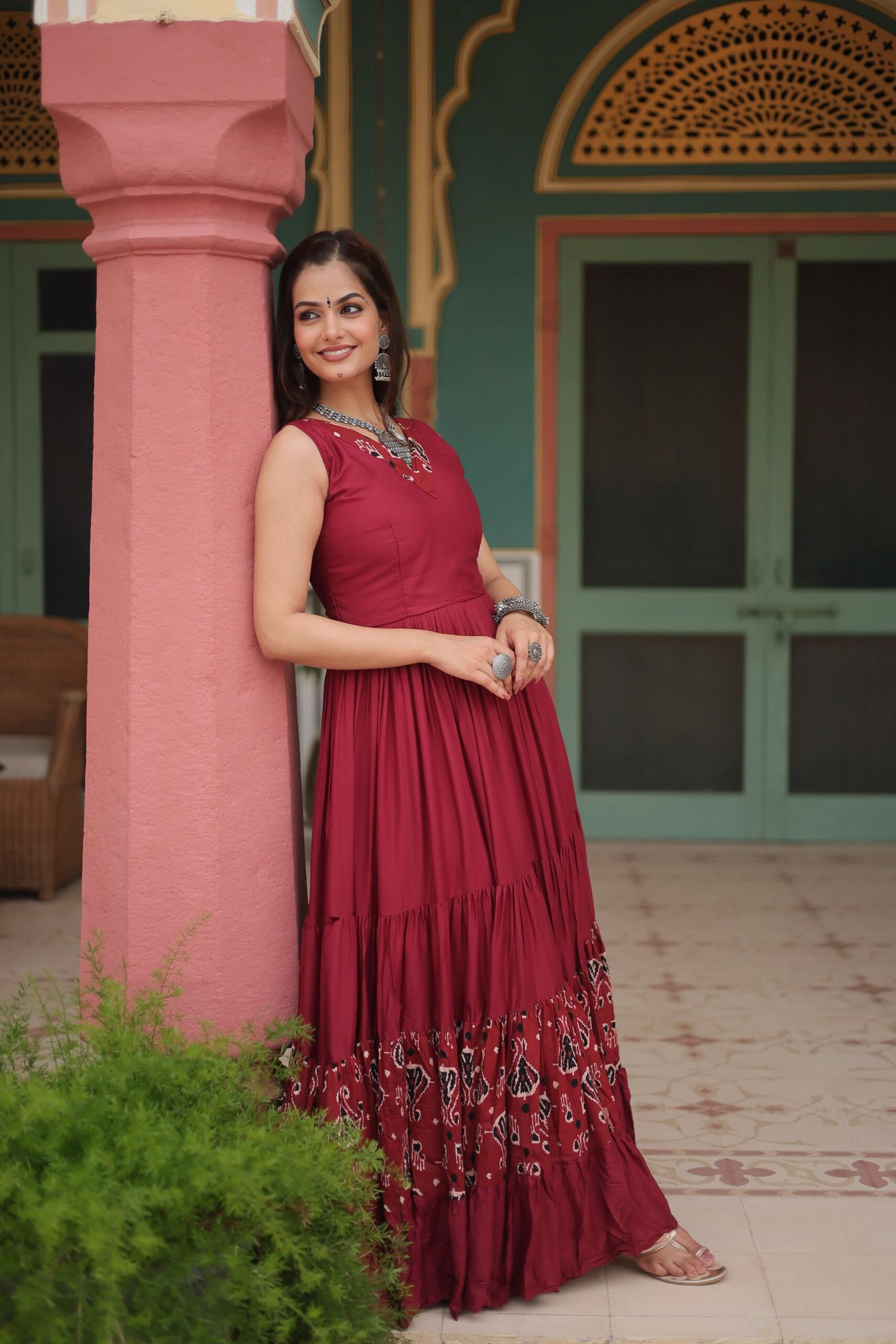 Maroon Designer Heavy Reyon Gown with Printed Frill & Fancy V-Neck - Image 6